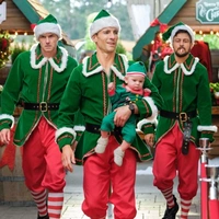 Drei Weihnachtsmänner und ein Baby - extra.image